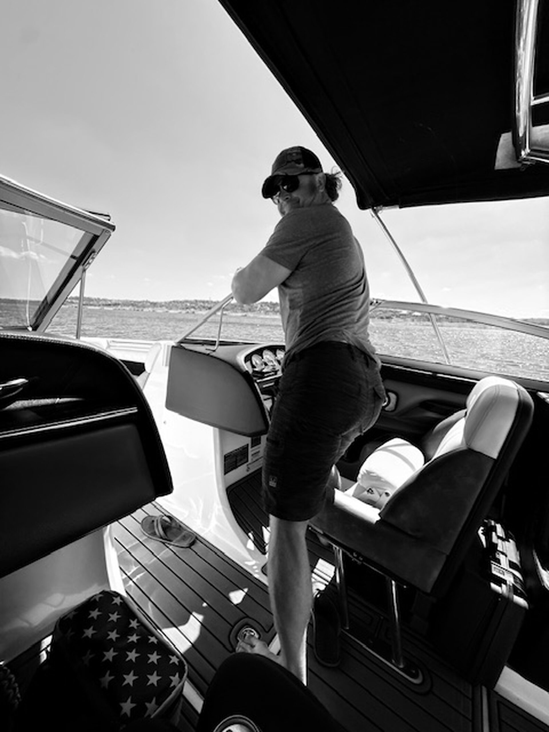 Captain Matt at the helm during a Lake Travis charter
